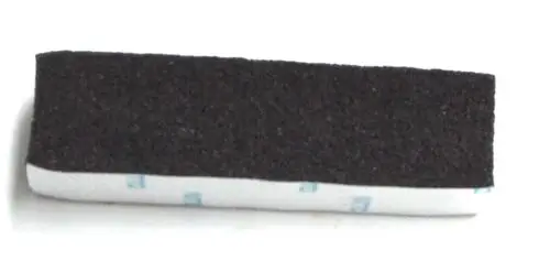 Schwarze Dichtkappe mit einer glatten Unterseite und einer beschichtet weißen Oberseite, möglicherweise von Daikin, geeignet für spezifische Anwendungszwecke.